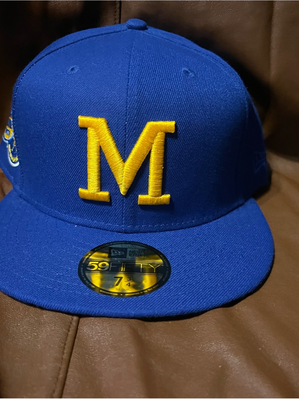 New Era Royal Blue Fitted Cap with Yellow 'M' Patch